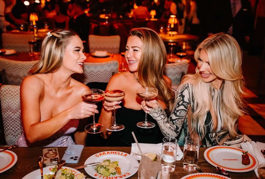 Girls dining at Caramella with drinks