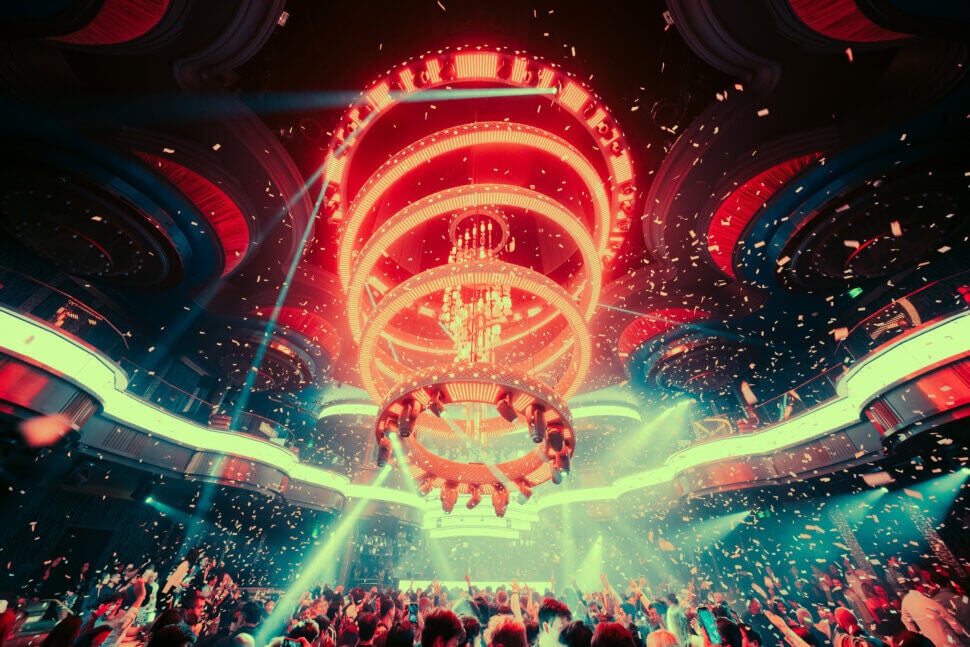 Omnia Chandelier and crowd partying