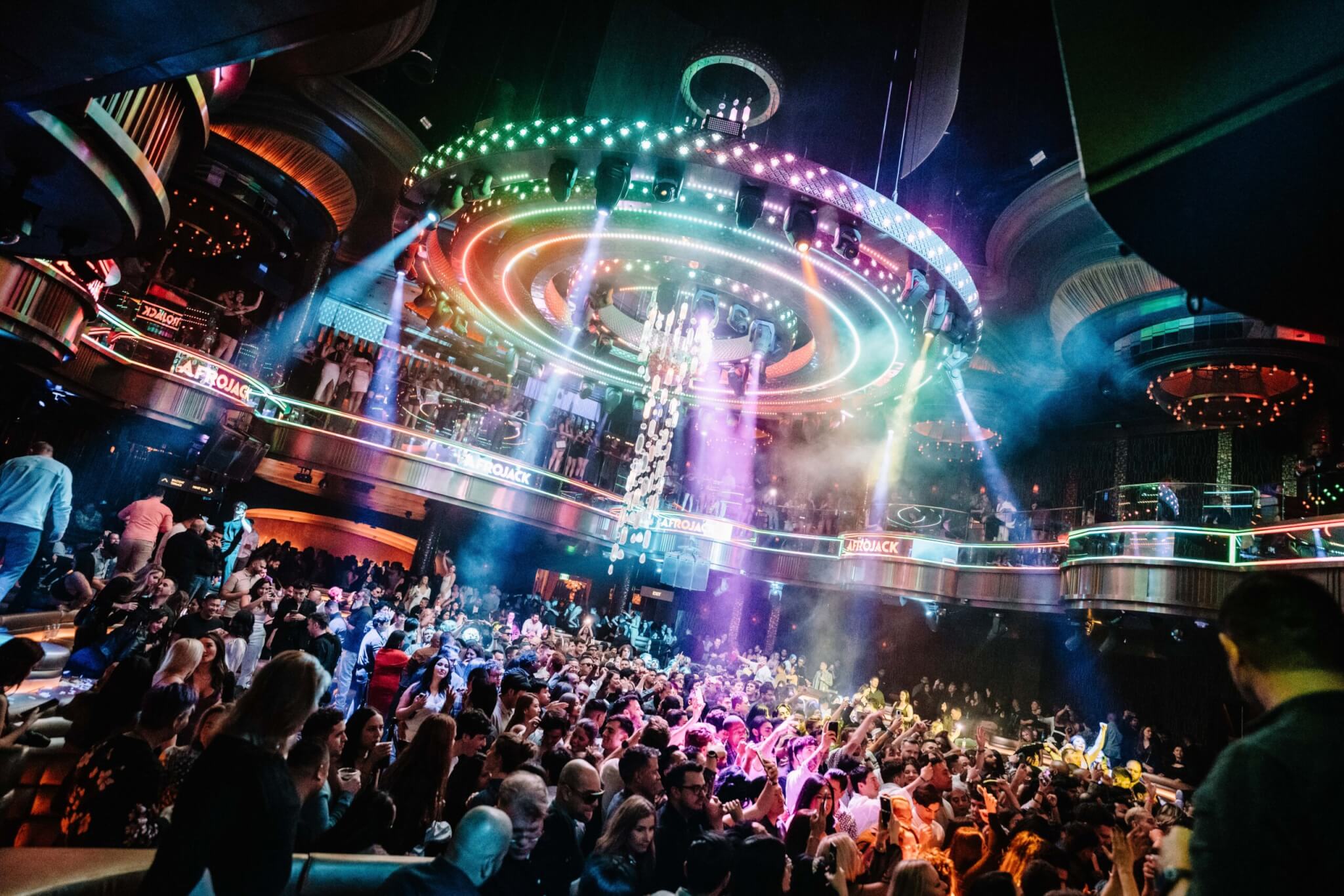 Omnia Chandelier and crowd partying